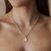 8ct yellow gold and silver pendant with hand engraved female figure