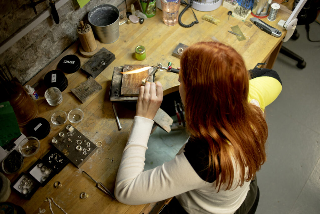 Lara at jewellery bench