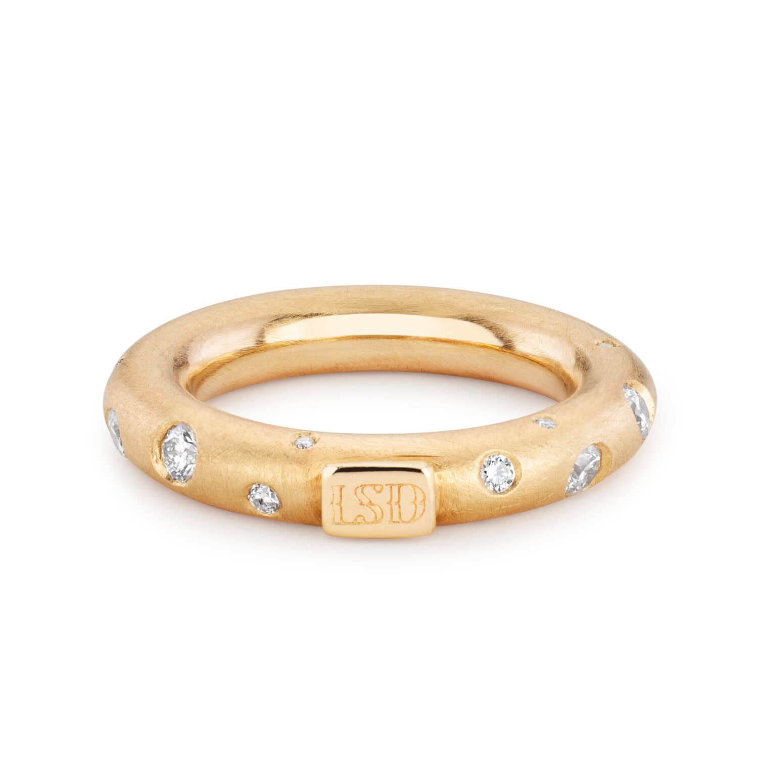 gold band with scattered diamonds