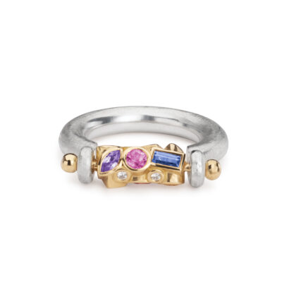 purple pink and blue spinning sapphire ring