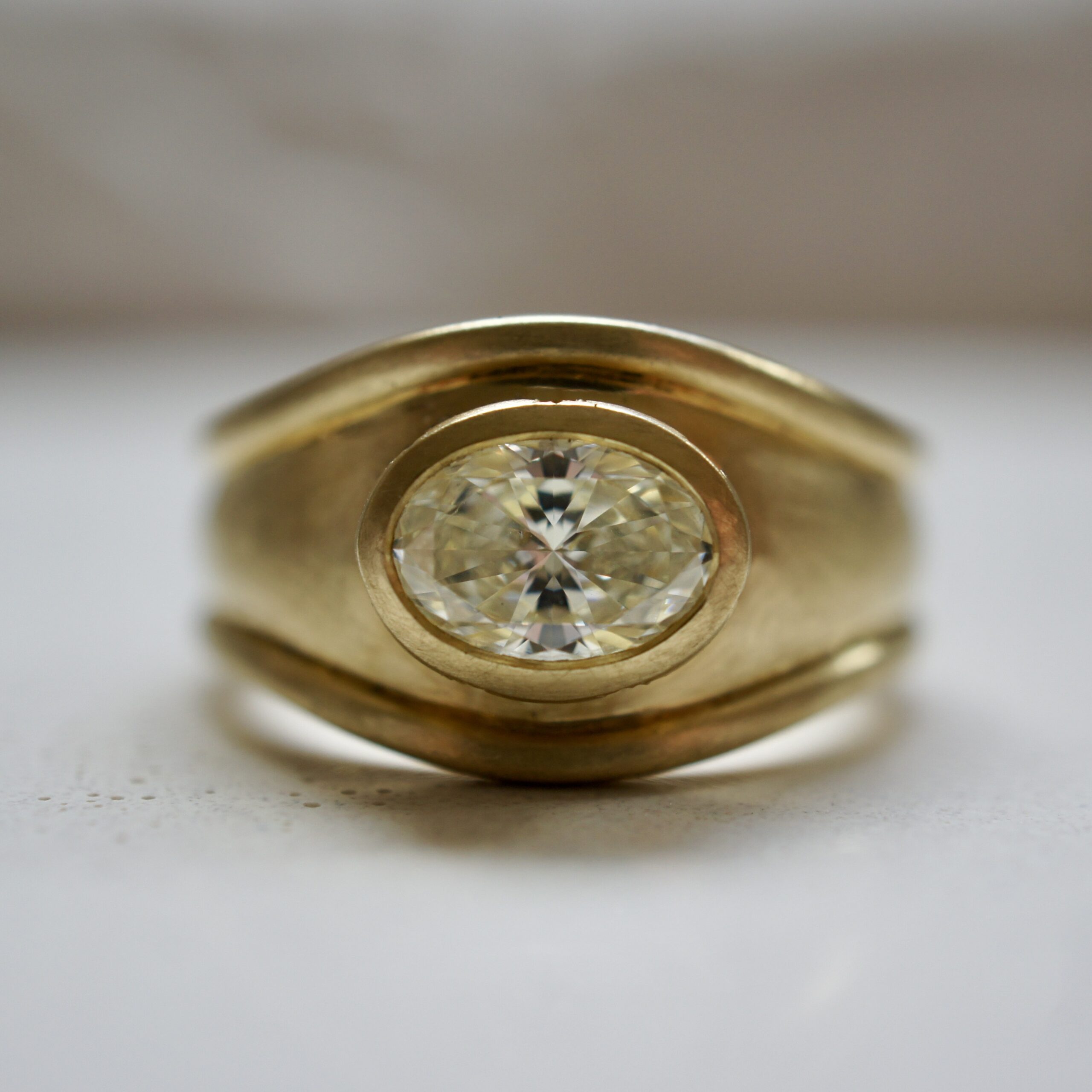 bespoke chunky engagement ring with natural oval diamond