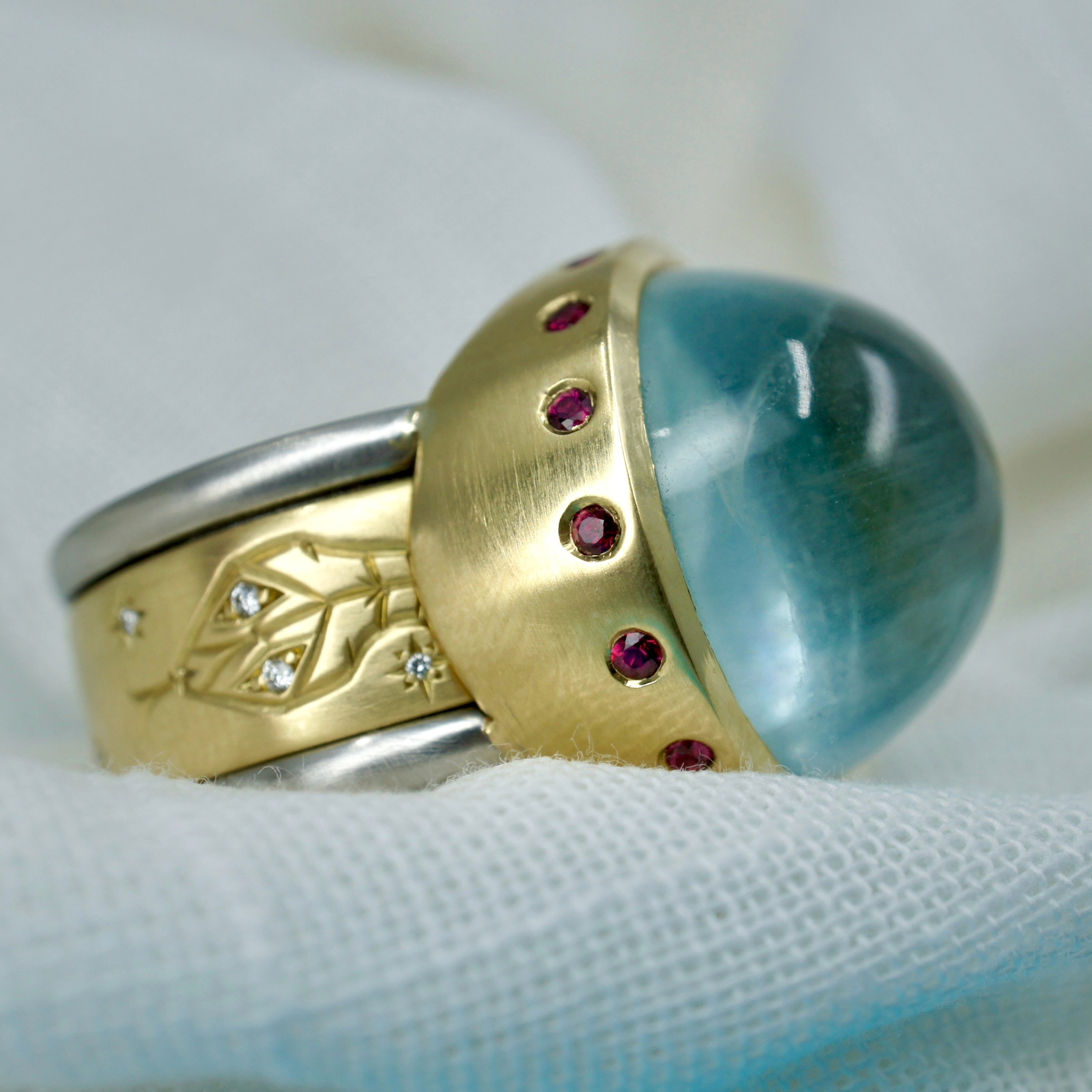 platinum, 18ct yellow gold, aquamarine, ruby and diamond spinning ring with engraved snake
