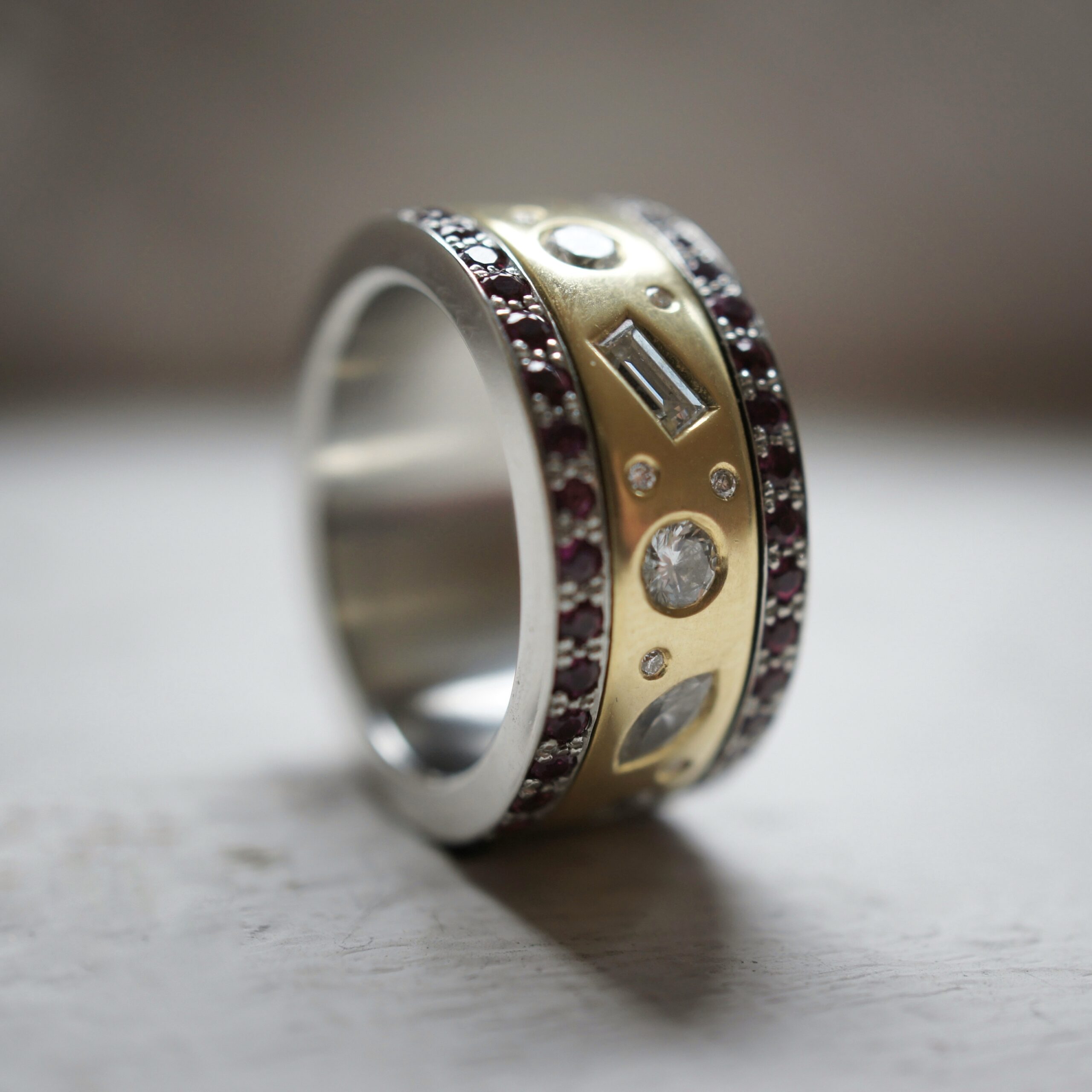 18ct gold, platinum, diamond and ruby spinning ring